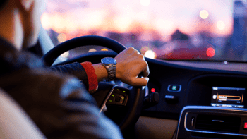 A car driver uses emotional sensing devices to evaluate his facial expression and blink frequency to detect signs of fatigue.